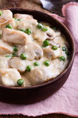 Chicken and mushroom stew in ceramic bowl