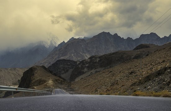 View or Karakoram Highway near Passu Pakistan. Passu is a small village on the Karakoram Highway, beside the Hunza River, some 15 kilometers from Gulmit, the Tehsil headquarters of Gojal in Gilgit.