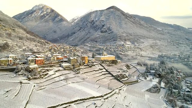 Aerial 4K - Valtellina (IT) - Vista panoramica invernale del Convento di San Lorenzo a Sondrio 