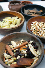 Vintage spices in wooden bowls.