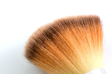 Close up of makeup brushes isolated on white background.