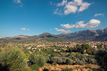 Fototapeta premium Soller village surrounded by Serra de Tramuntana mountains range, Majorca in Balearic Islands, Spain