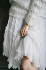 Girl in white ruffle skirt with flounces