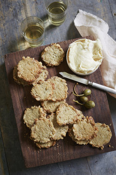 Crackers with butter and capers