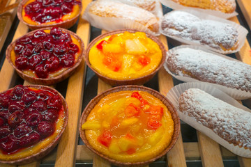 Fototapeta na wymiar Fresh pastries for sale in a bakery