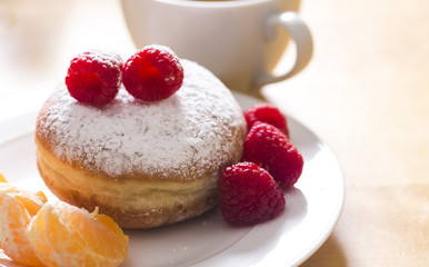 Berlin buns with raspberries