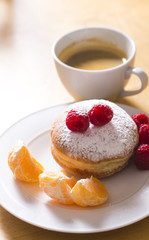 Berlin buns with raspberries