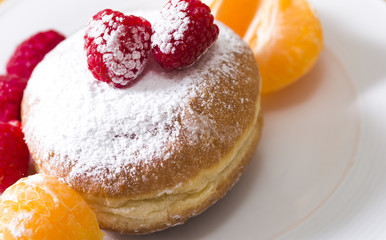 Berlin buns with raspberries