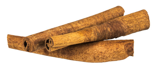 Cinnamon sticks isolated on white background. Close up