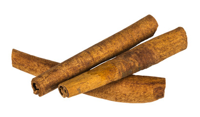Cinnamon sticks isolated on white background. Close up