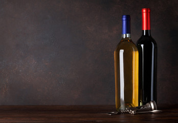 Fototapeta na wymiar Red and white wine bottles