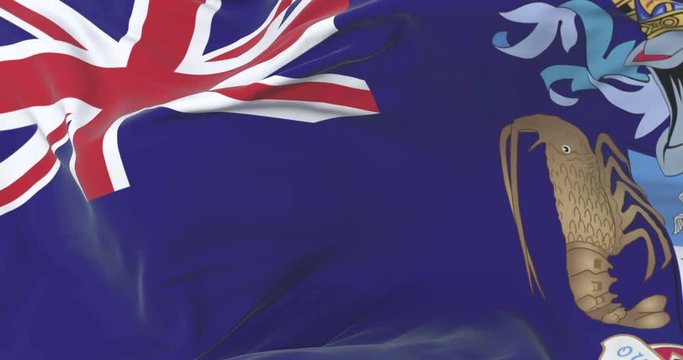 Flag of Tristan da Cunha waving at wind in slow with blue sky, loop
