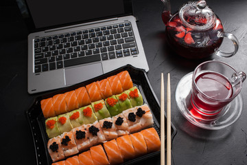 food photography art. sushi rolls set. japanese cuisine dinner delivery concept. Business lunch.