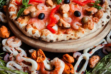 Photo sur Aluminium brossé Pizzeria Mediterranean pizza with seafood and olives. Classical italian recipe concept