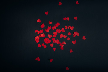 Love red hearts on dark background