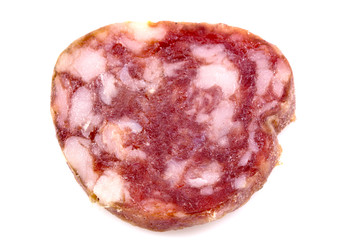 Obraz premium Top view macro detail of smoked salami slices, pepperoni slice, Italian prosciutto crudo ,raw ham texture isolated on white background , with clipping path.