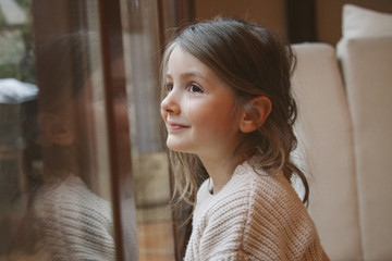 cheerful little girl waiting for christmas