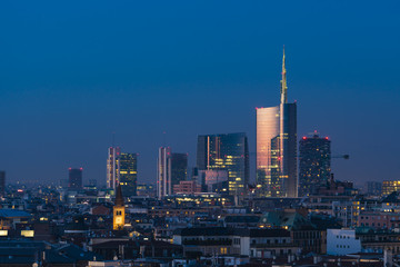 Milan cityscape at sunset with new skyscrapers of Porta Nuova financial and business district