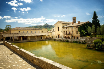Fototapeta premium Old thermal baths in the medieval village Bagno Vignoni, Siena, Tuscany, Italy