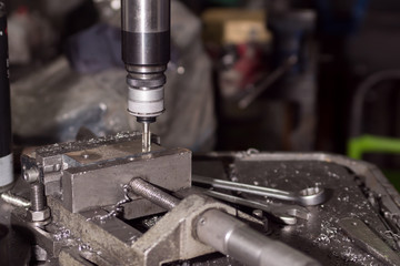 milling details on a metal-cutting machine. production at a small enterprise