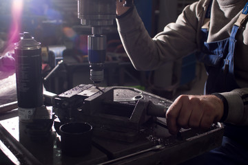 milling details on a metal-cutting machine. production at a small enterprise