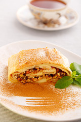 Pecan pie with cinnamon and mint