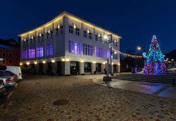 Traditional street decoration in Zakopane in the evening. © velishchuk
