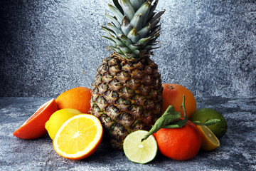 Citrus background. Assorted fresh citrus fruit. Lemon, orange lime, grapefruit. Fresh and colorful concept.