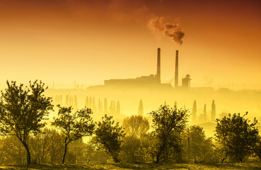 Obraz premium Power station with smoking chimney