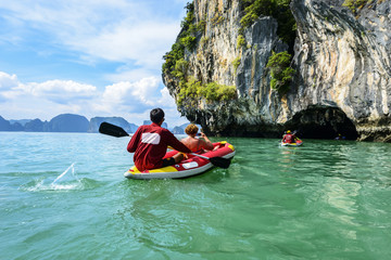 Tourist are visiting by flatwater canoeing. Located in Ao Phang Nga National Park, Phuket, Thailand.