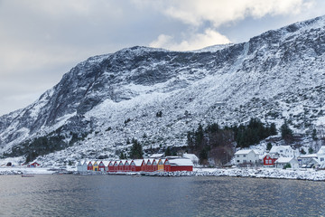 Colorful classic Norwegian Rorbu fishing hut in Alnes.