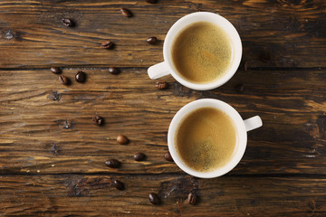 Hot strong coffee on the wooden table