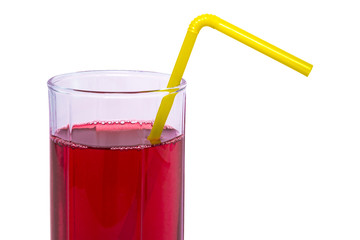 Glass of red juice with yellow tubule isolated on white background