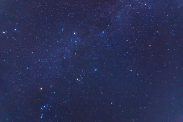 Schilderijen op glas Winter forest timelapse, frosty and pure air, a night sky with millions of stars. Sikhote-Alin Nature Reserve, a biosphere reserve in Russia. © alexhitrov