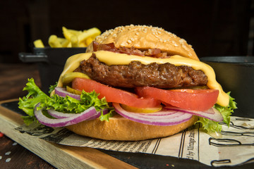 Burger on a wooden board