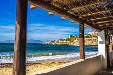 Windmills on the cliff with blue sky in Mykonos Island Greece Cyclades