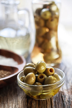 green olives in a glass bowl
