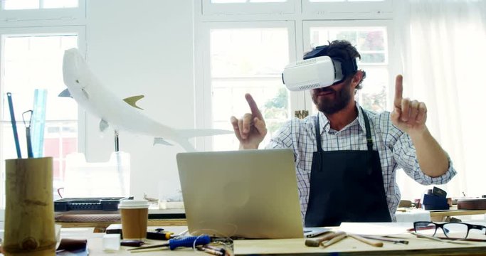 Craftsman using virtual reality headset 