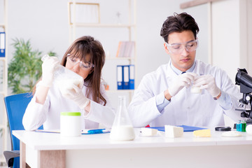 Two lab doctor testing food products