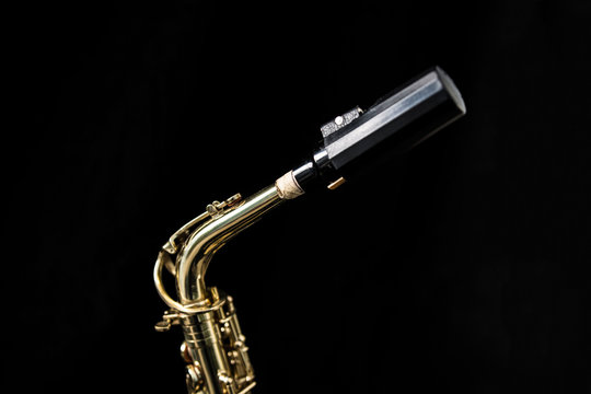 Close up of a golden saxophone