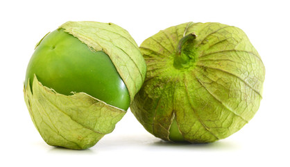 Two tomato tomatillos fruits isolated on white background