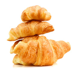 Fresh and tasty croissant over white background