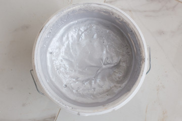 Silver tin paint can opened