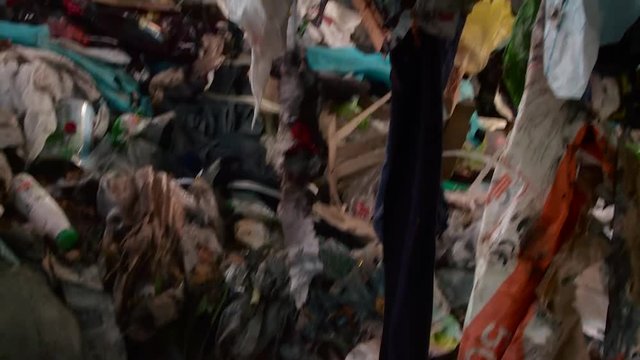 Processing of waste, garbage. Urban landfill. Sorting. Montain garbage. Ecology.