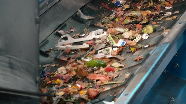 Processing of waste, garbage. Urban landfill. Sorting. Montain garbage. Ecology.