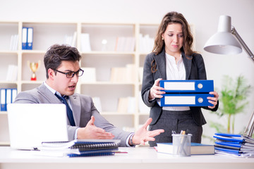 Angry boss unhappy with female employee performance