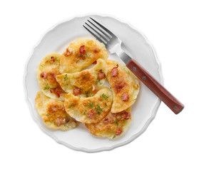 Plate with tasty dumplings on white background