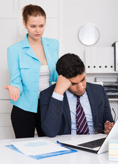 Frustrated businessman with angry chief