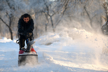 Snow removal with a snow blower 