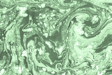 Suminagashi marble texture hand painted with green ink. Digital paper 863 performed in traditional japanese suminagashi floating ink technique. Tempting liquid abstract background.